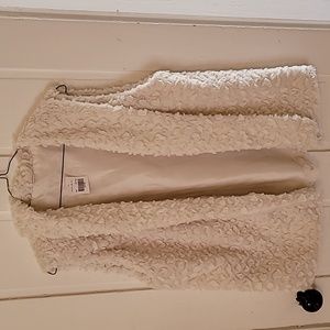 NWT, soft fur like ladies vest.  Lightweight.
